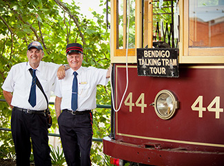 Two Tram Drivers standing next to Vintage Talking Tram Number 44 at the Bendigo Tramways Depot