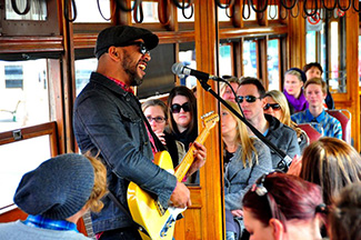 Musician performing aboard the Bendigo Tramways Blues Tram 